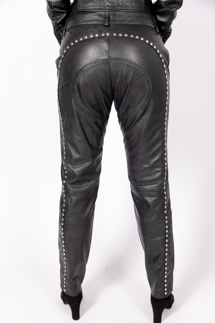 Leather trousers in genuine leather with lacing and rivets